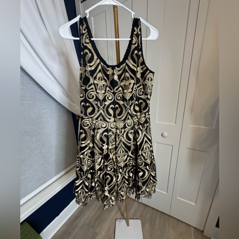 Elegant Black and Gold Patterned Dress